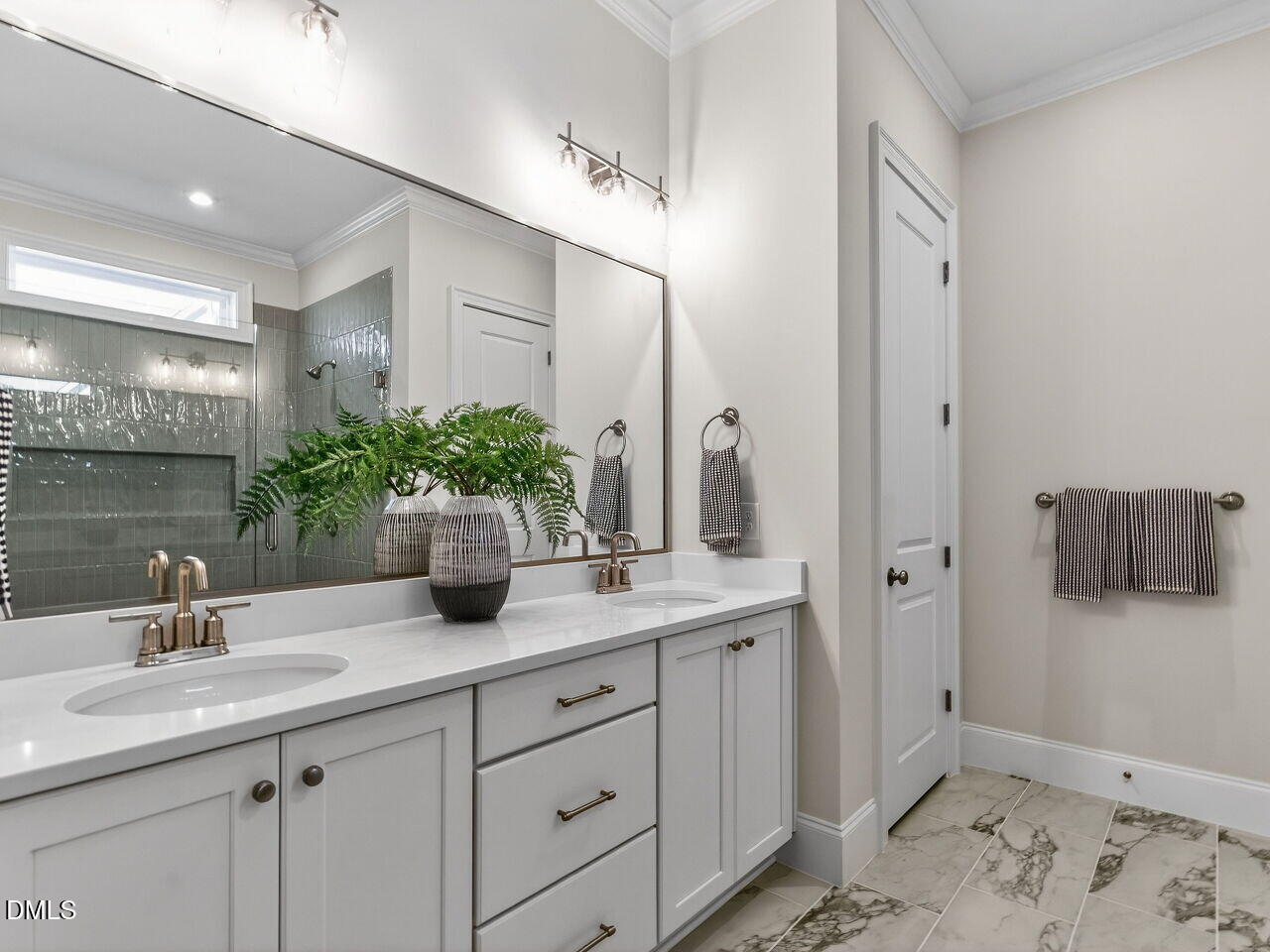 8912 Thompson Mill Road Wake Forest, NC 27587 - Photo 33 of 41 a bathroom with a sink double vanity granite and a mirror