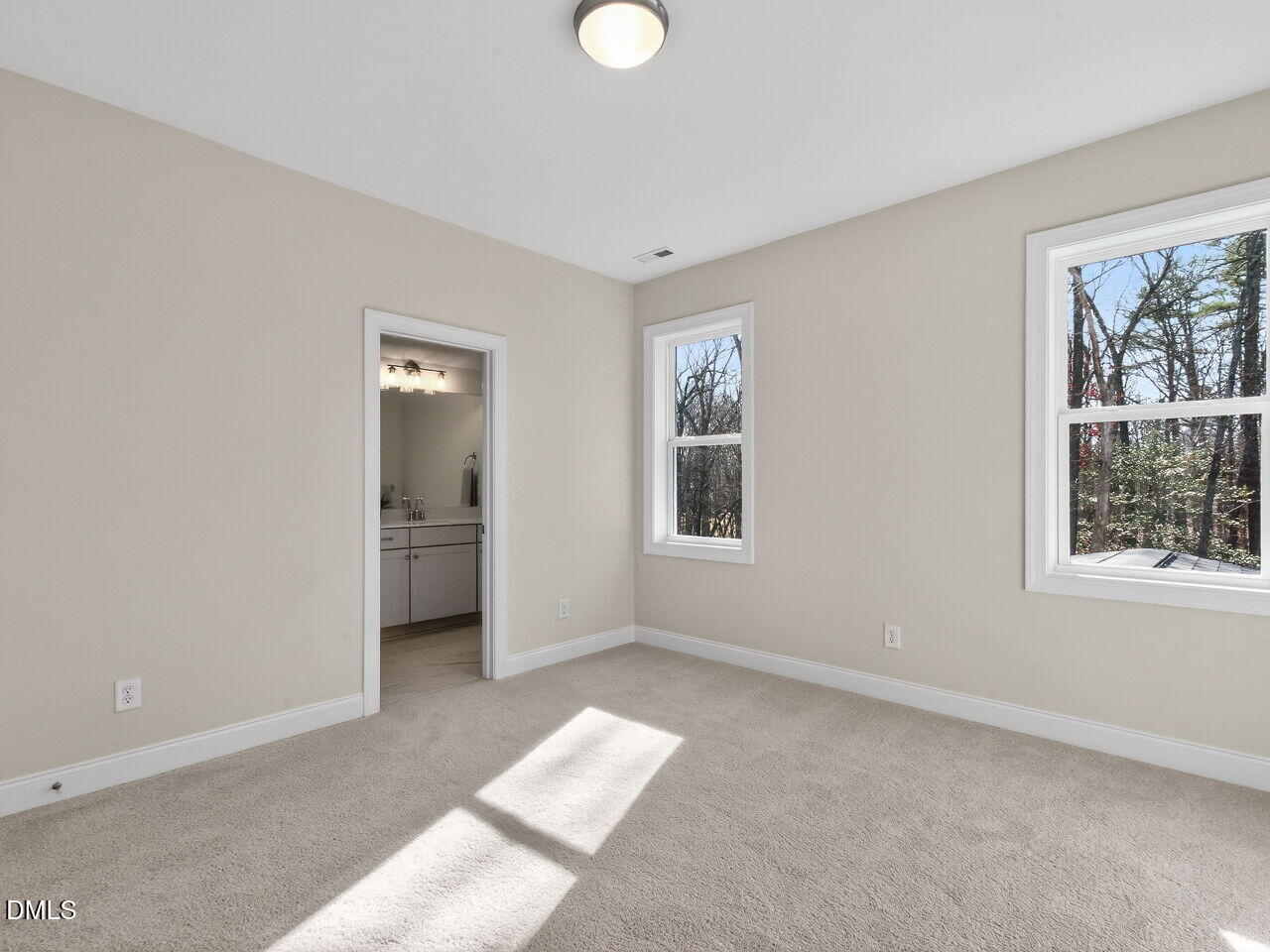 8912 Thompson Mill Road Wake Forest, NC 27587 - Photo 40 of 41 a view of an empty room with a window