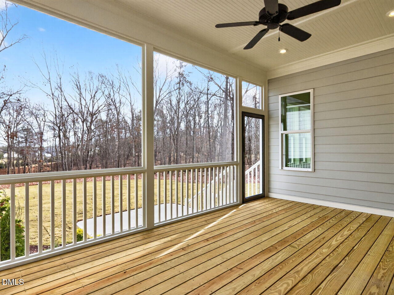 8912 Thompson Mill Road Wake Forest, NC 27587 - Photo 4 of 41 a view of a balcony with wooden floor