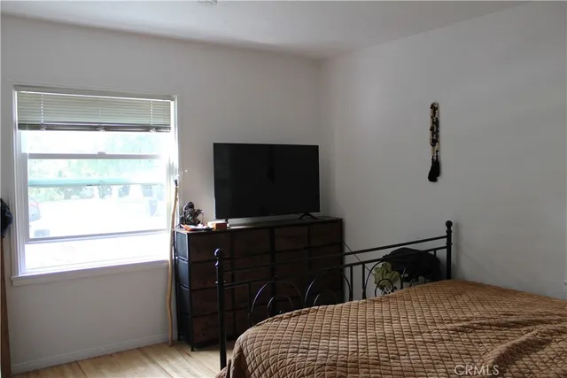 a view of a backyard with chairs