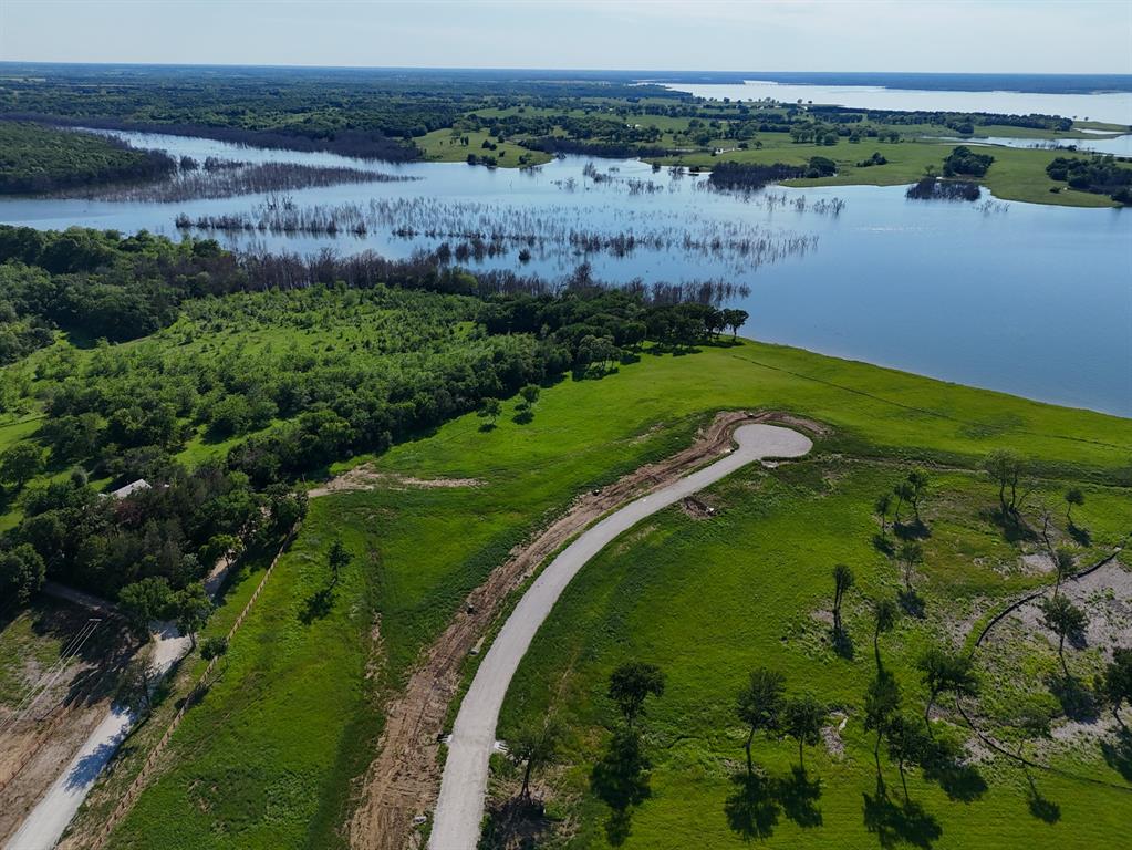a view of a lake with a city