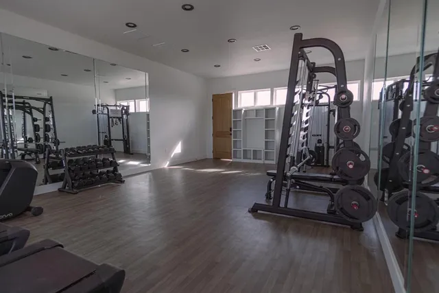a view of a room with gym equipment