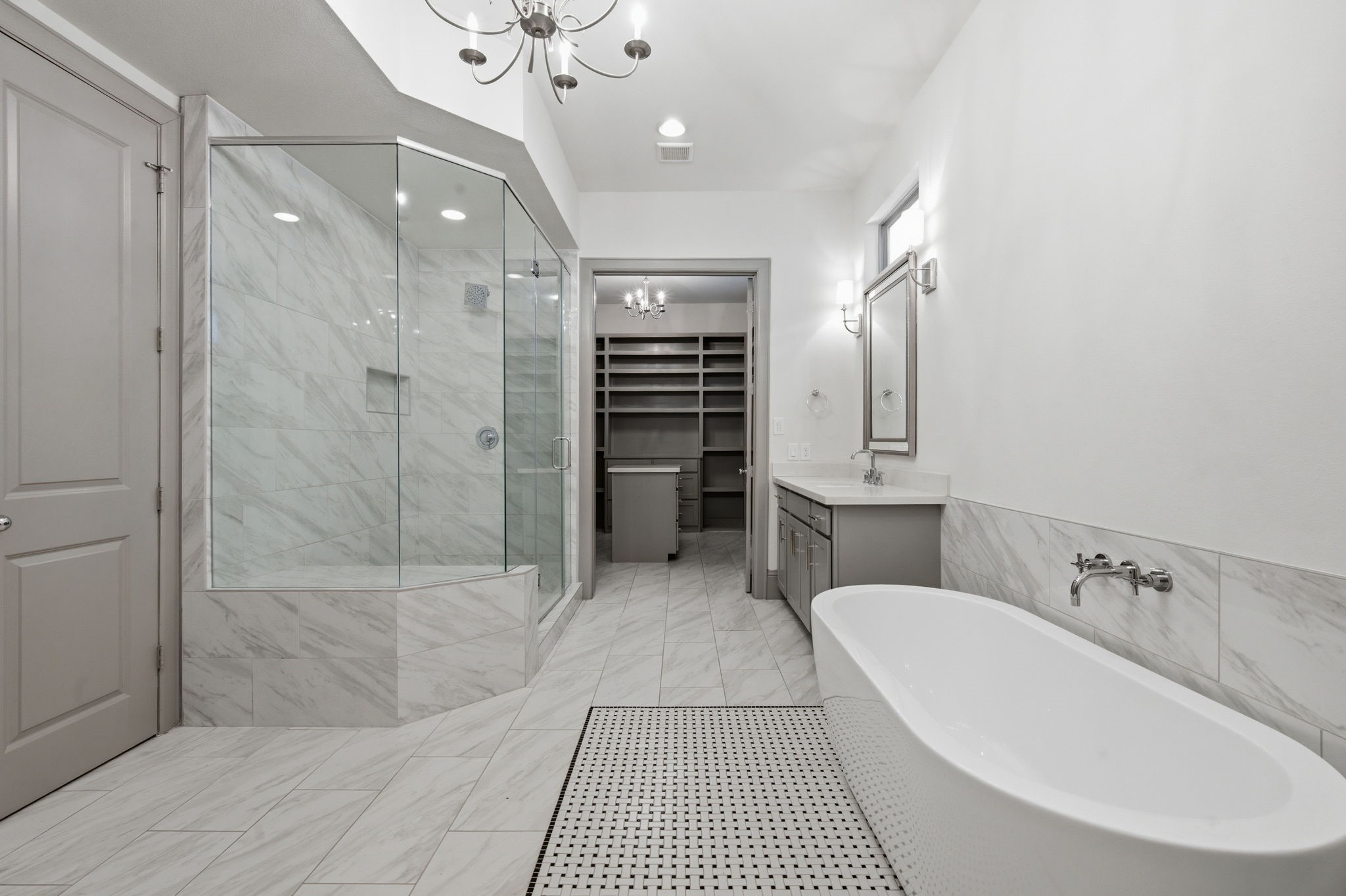 1906 West 25th Street Houston, TX 77008 - Photo 21 of 47 Massive walk in shower, seperate from tub; Closet full of custom built ins