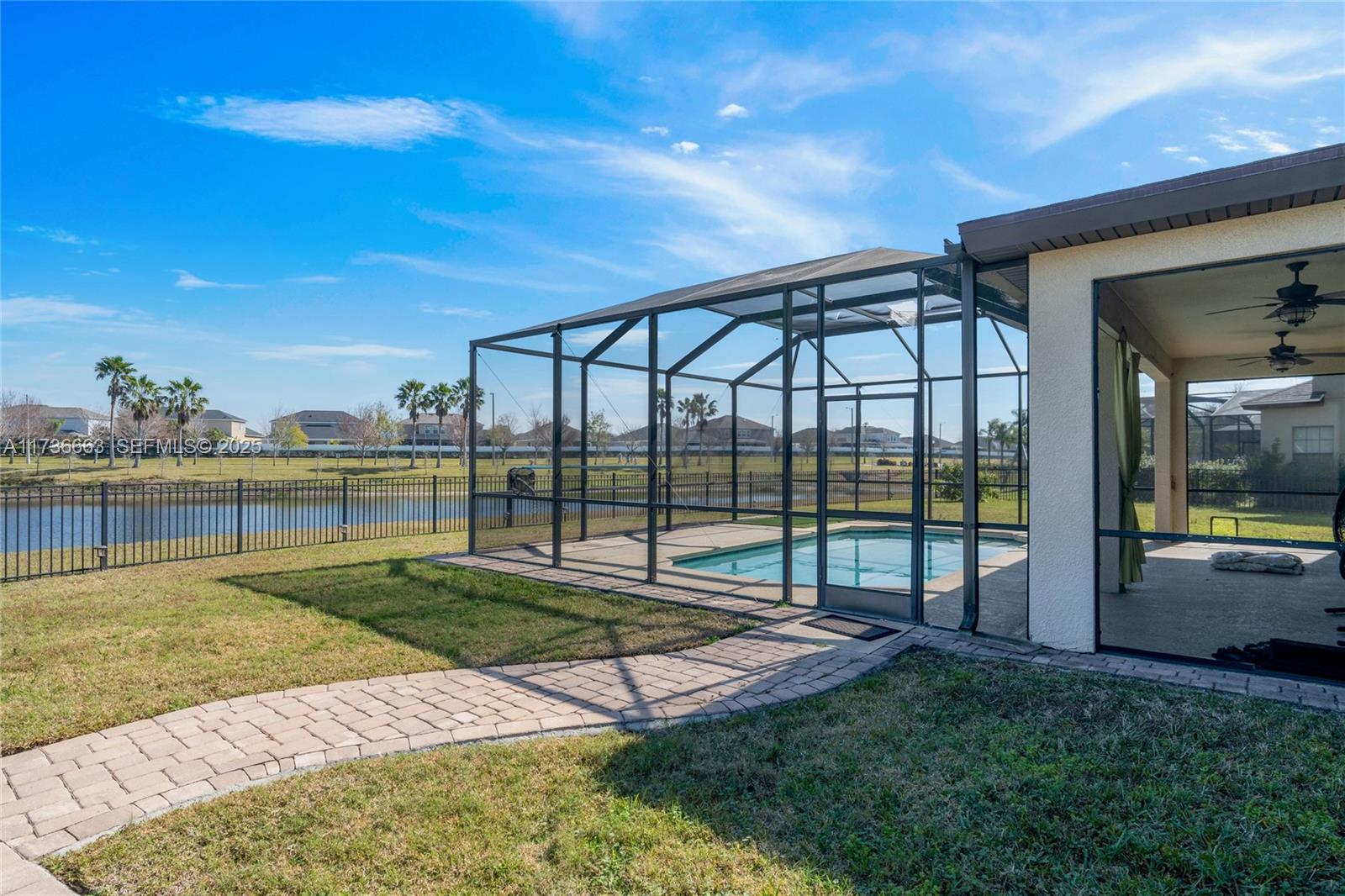 11436 Drifting Leaf Drive Riverview, FL 33579 - Photo 20 of 21 a view of a backyard with a garden and plants