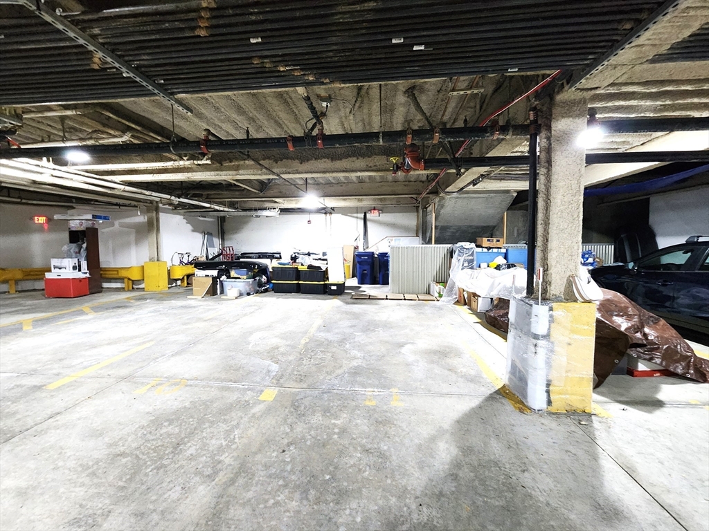 24 Bay State Road, Unit 11 Cambridge, MA 02138 - Photo 25 of 26 a view of parking garage with cars