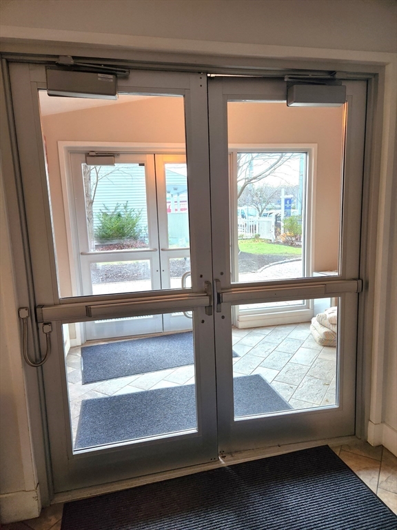 24 Bay State Road, Unit 11 Cambridge, MA 02138 - Photo 5 of 26 a view of front door