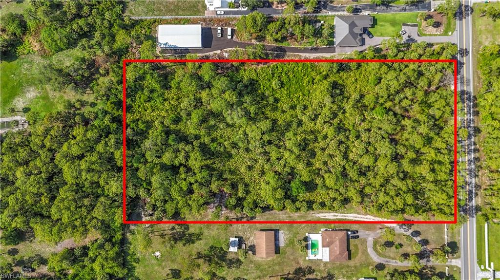 23rd Street Southwest Naples, FL 34117 - Photo 14 of 17 Aerial view of property's location with property boundaries highlighted