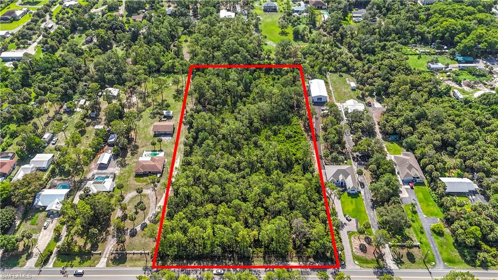 23rd Street Southwest Naples, FL 34117 - Photo 9 of 17 Aerial overview of property's location featuring property boundaries highlighted