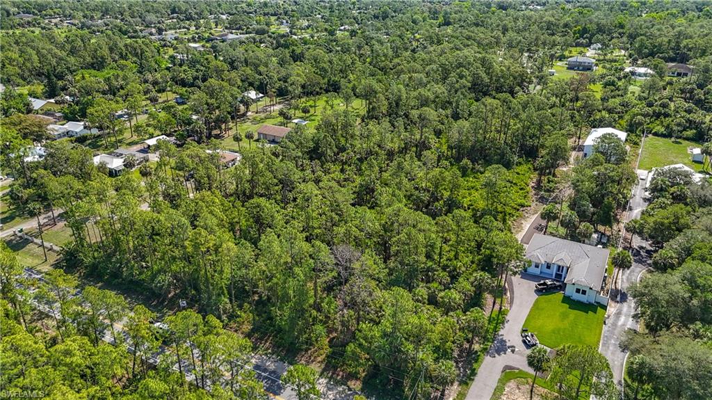 23rd Street Southwest Naples, FL 34117 - Photo 10 of 17 Bird's eye view of a heavily wooded area