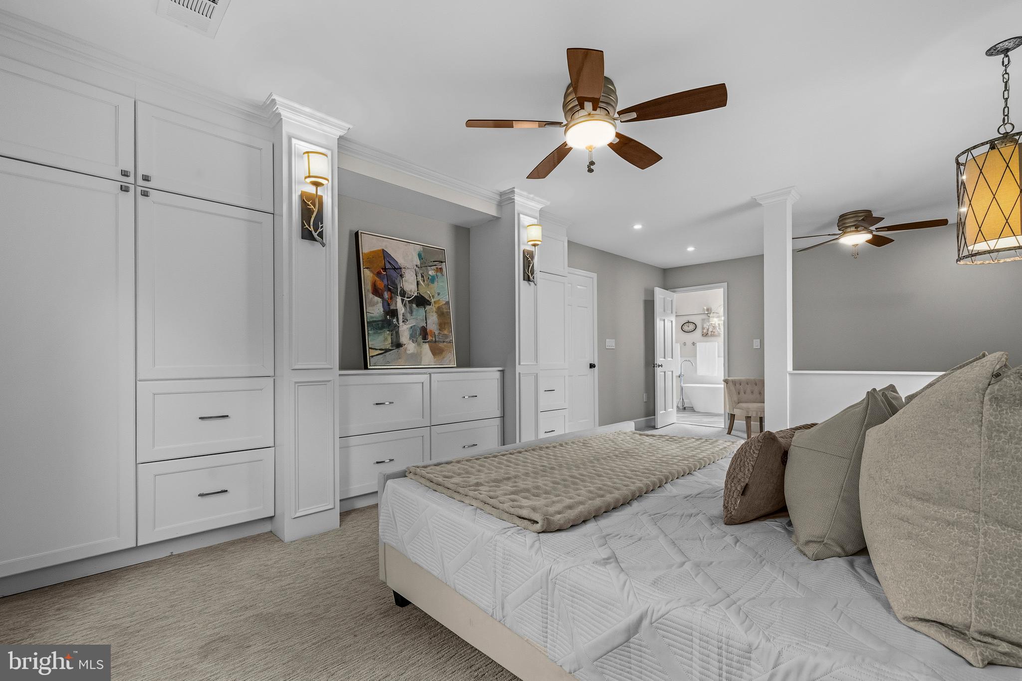 4007 West Braddock Road Alexandria, VA 22304 - Photo 21 of 52 a bedroom with a large bed and a chandelier