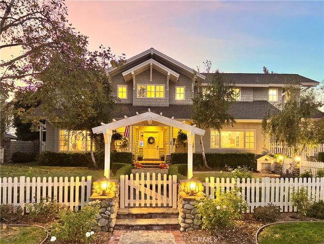 a large white kitchen with a large window