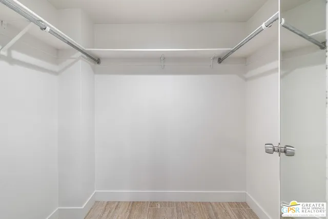 a view of a room with racks on the wall