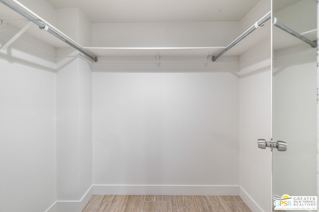 2029 Ramitas Way Palm Springs, CA 92264 - Photo 21 of 41 a view of a room with racks on the wall