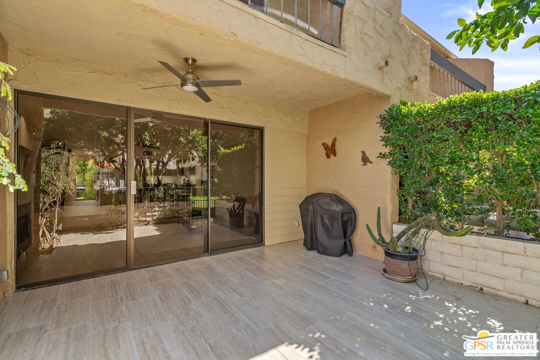 2029 Ramitas Way Palm Springs, CA 92264 - Photo 30 of 41 a dining room with furniture and a potted plant