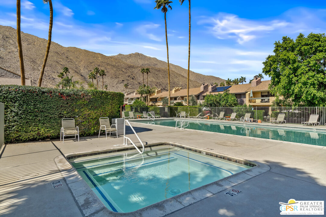 2029 Ramitas Way Palm Springs, CA 92264 - Photo 37 of 41 a view of a swimming pool with a lake view