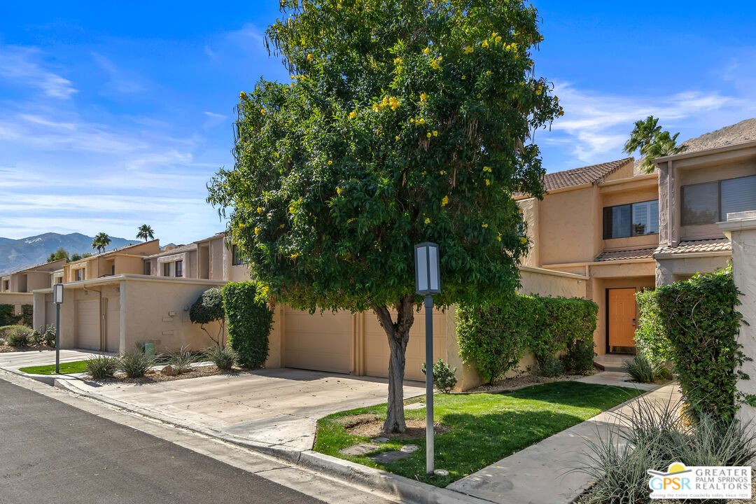 2029 Ramitas Way Palm Springs, CA 92264 - Photo 40 of 41 a house with tree in front of it