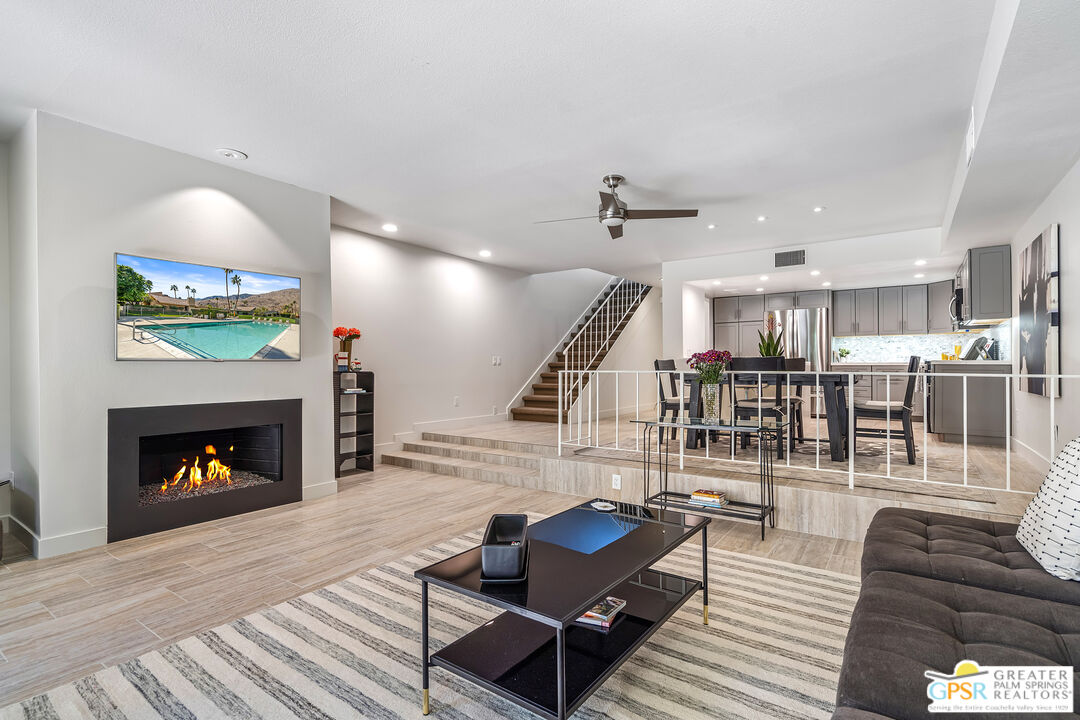2029 Ramitas Way Palm Springs, CA 92264 - Photo 6 of 41 a living room with furniture and a fireplace