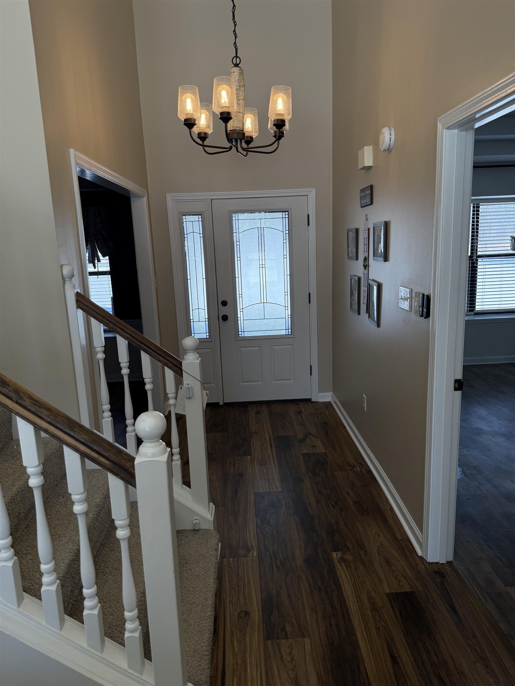 3415 Chambers Road Millington, TN 38053 - Photo 3 of 27 Entrance foyer with dark wood finished floors, suspended lighting, and a high ceiling