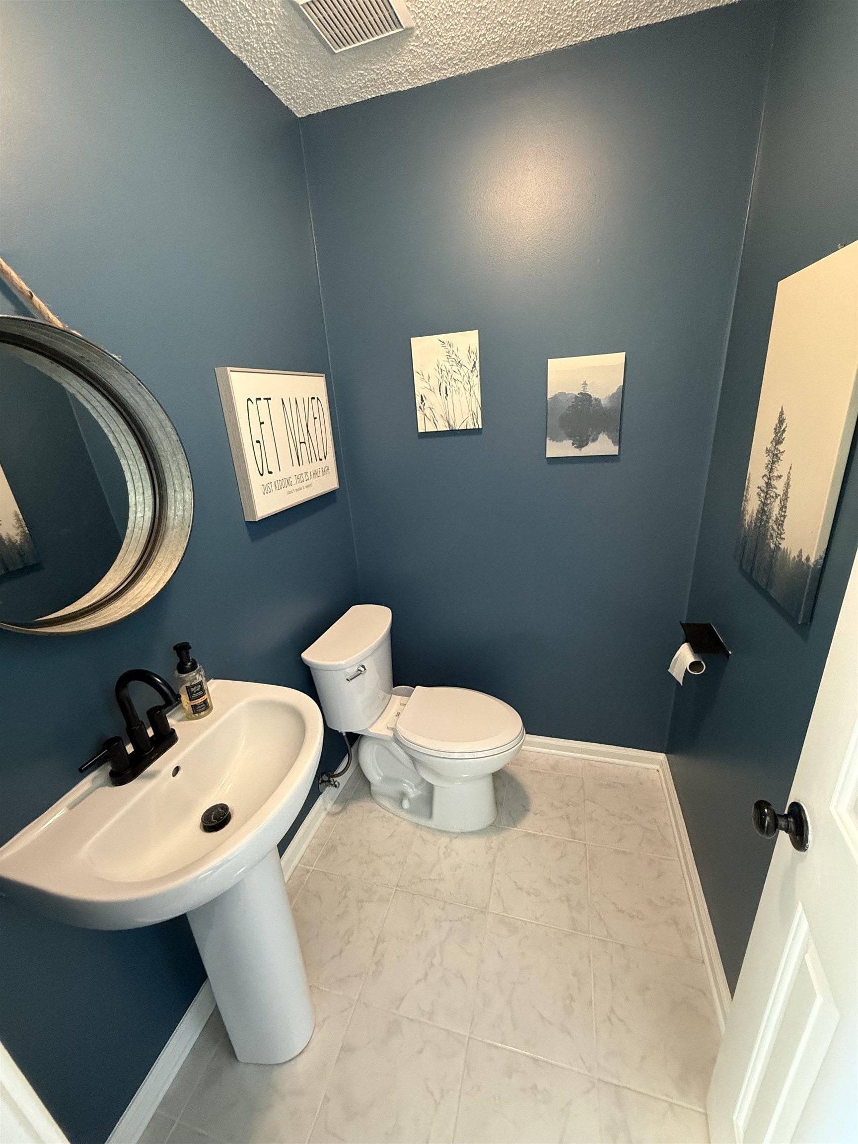 3415 Chambers Road Millington, TN 38053 - Photo 7 of 27 Half bath with toilet and a textured ceiling