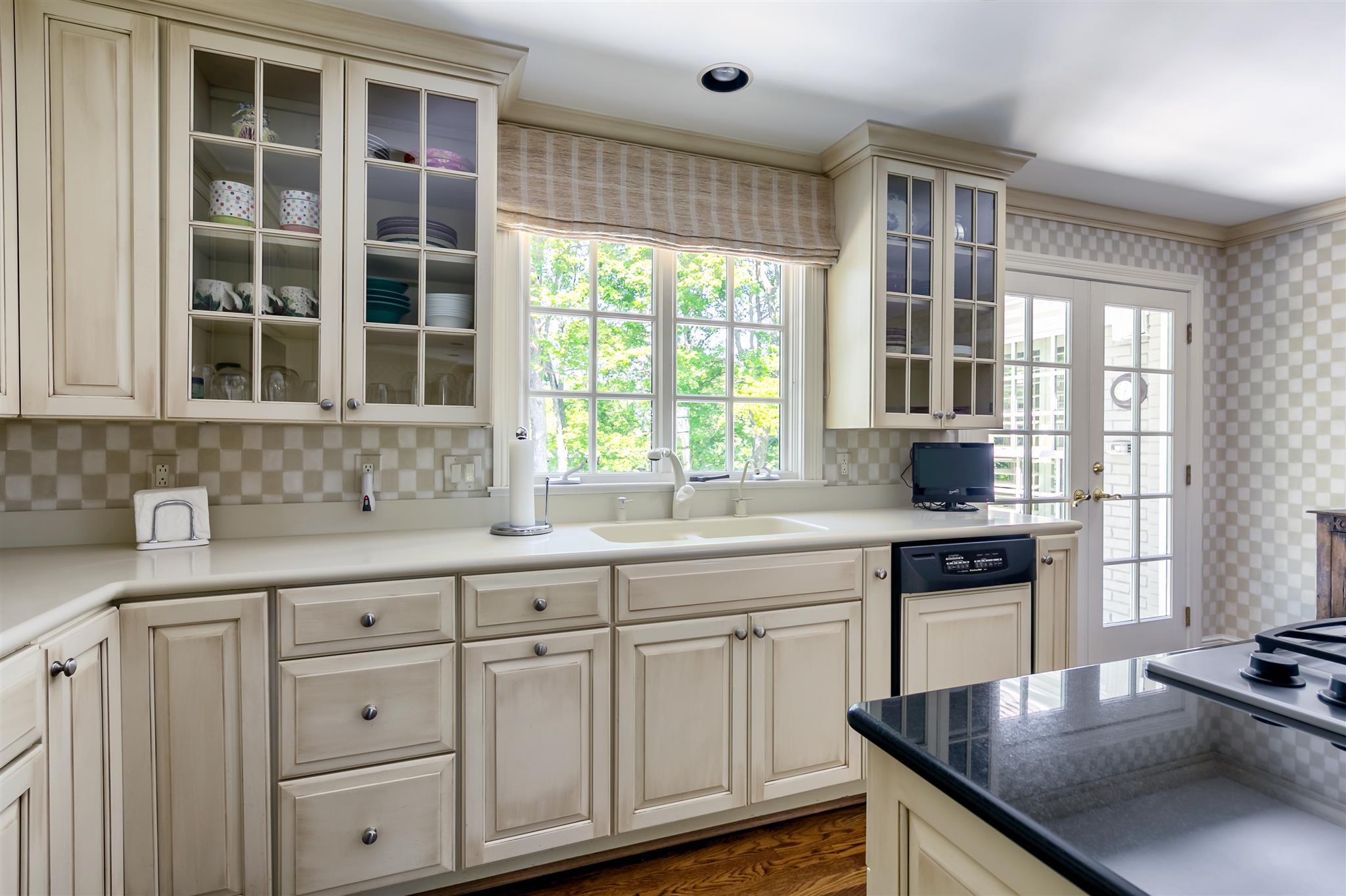 4508 Murfreesboro Road Franklin, TN 37067 - Photo 12 of 30 a kitchen with white cabinets and a window
