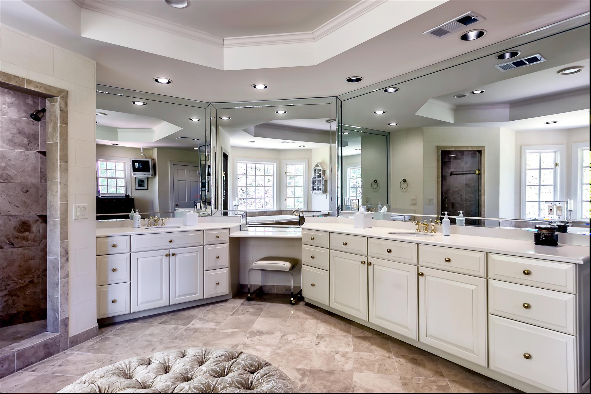 4508 Murfreesboro Road Franklin, TN 37067 - Photo 20 of 30 a large bathroom with a large mirror vanity and shower