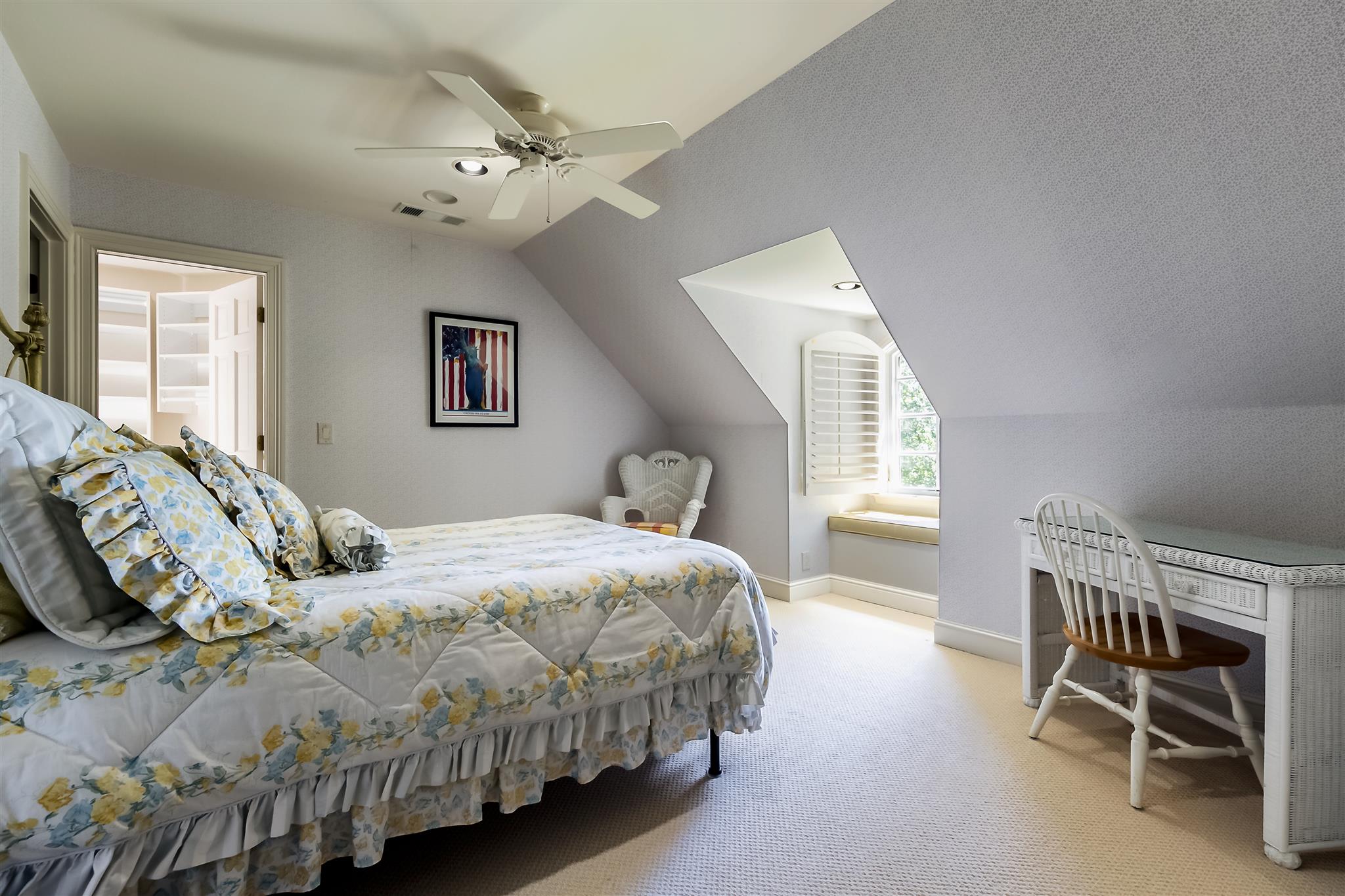 4508 Murfreesboro Road Franklin, TN 37067 - Photo 22 of 30 a bedroom with a large bed and a chandelier