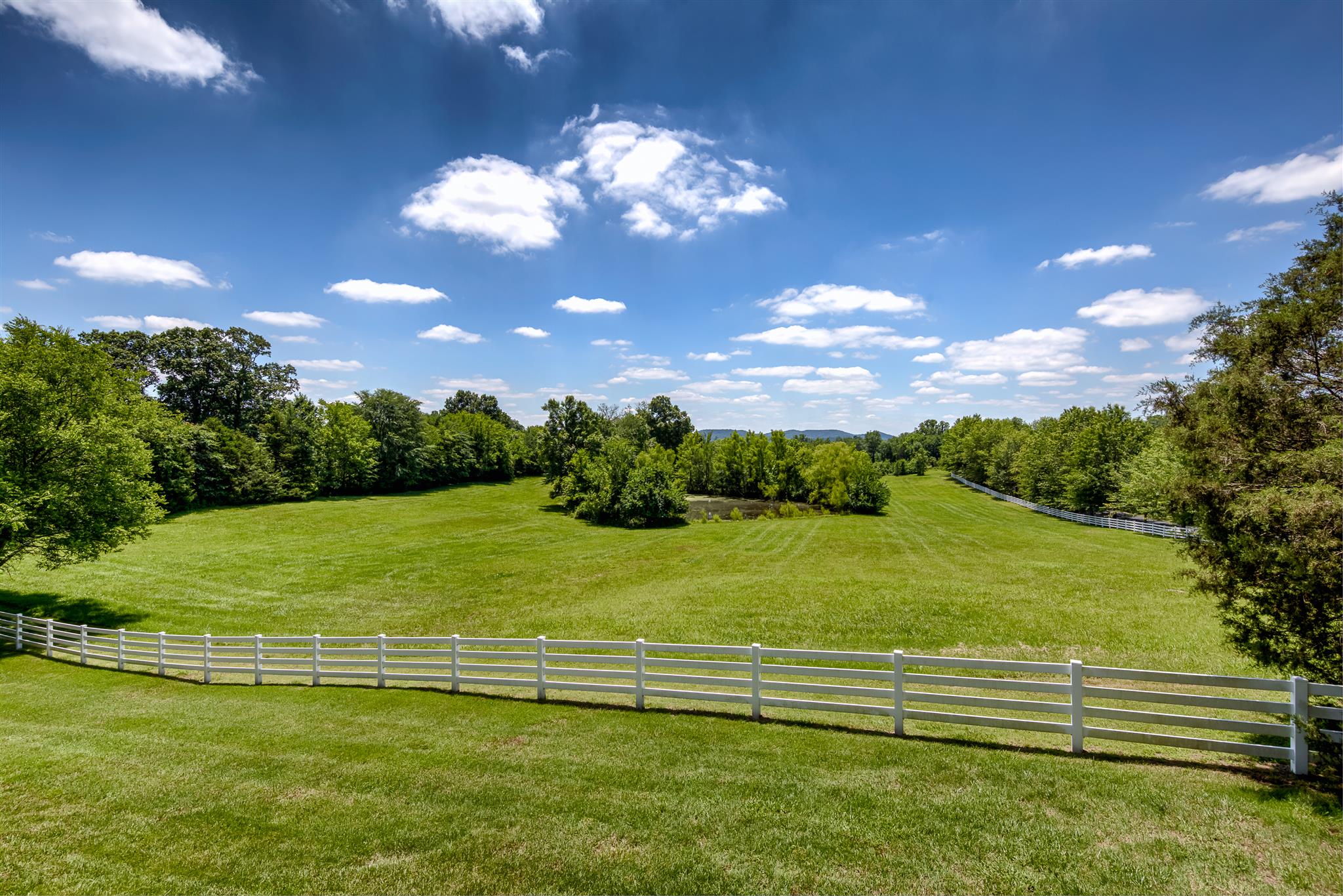 4508 Murfreesboro Road Franklin, TN 37067 - Photo 26 of 30 a view of a golf course with a lake