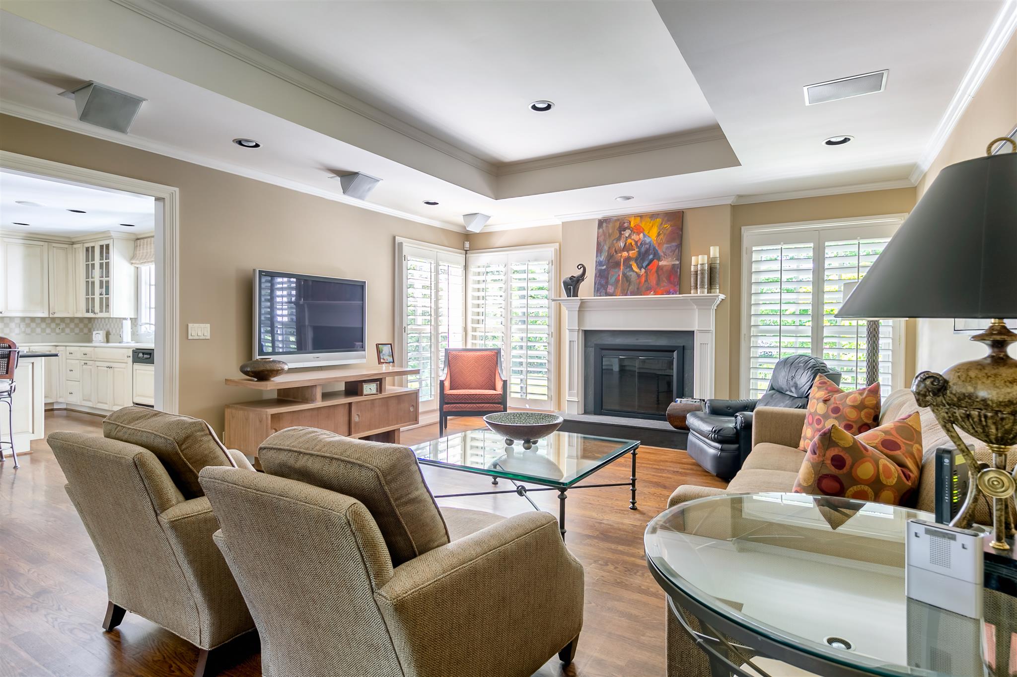 4508 Murfreesboro Road Franklin, TN 37067 - Photo 7 of 30 a living room with furniture a fireplace and a flat screen tv