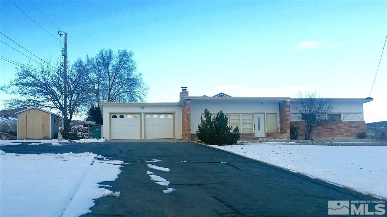 201 Hoge Road Reno, NV 89506 - Photo 1 of 1 a view of a house with a yard