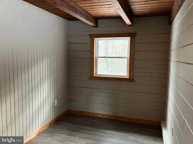 a view of a door and a window