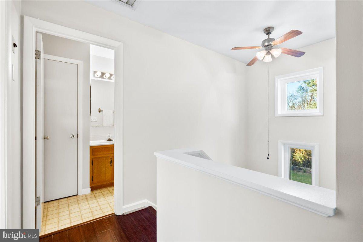 6936 Linganore Road Frederick, MD 21701 - Photo 19 of 33 a view of an entryway with wooden floor