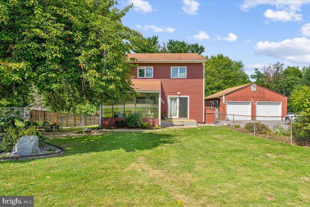 6936 Linganore Road Frederick, MD 21701 - Photo 2 of 33 a view of a house with a yard and sitting area