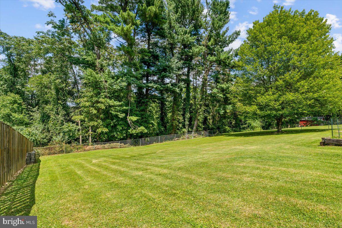 6936 Linganore Road Frederick, MD 21701 - Photo 31 of 33 a view of a field with trees in the background