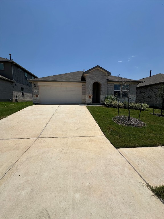 a house view with a garden space