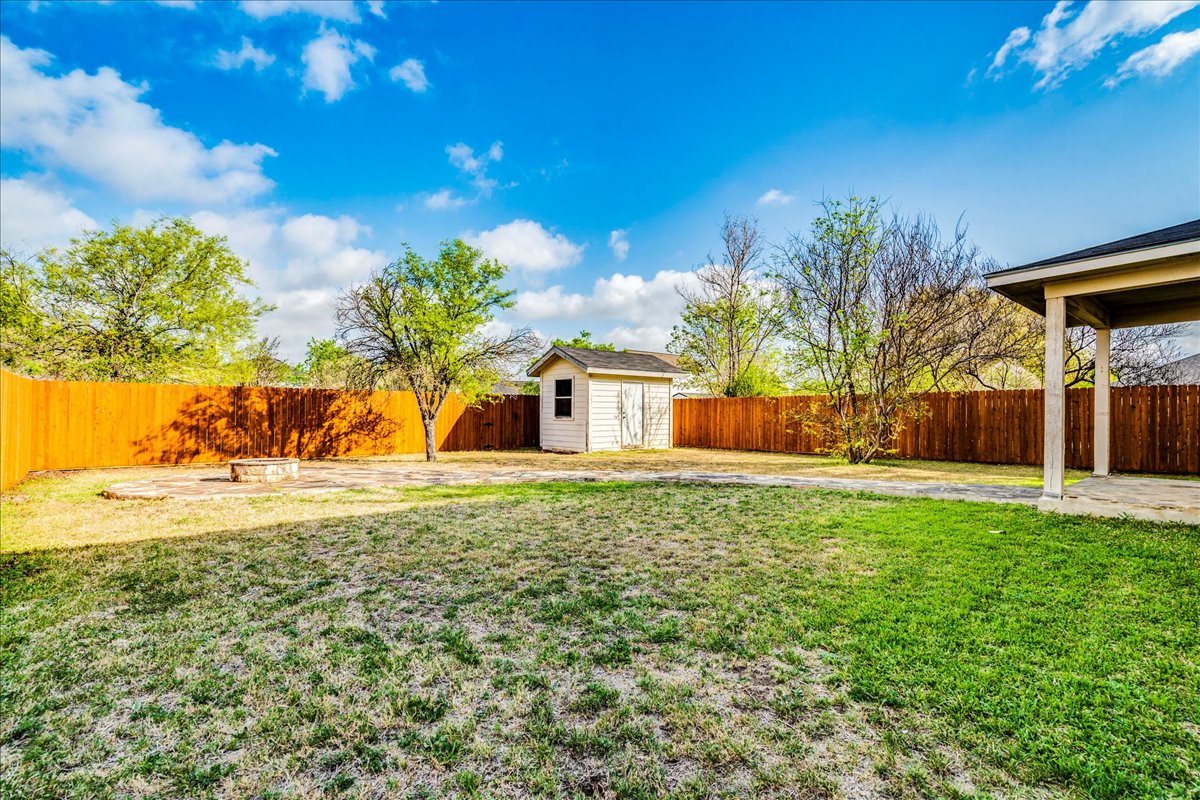 267 Carolyns Way Buda, TX 78610 - Photo 31 of 31 a view of a yard