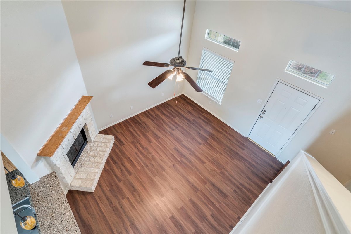 267 Carolyns Way Buda, TX 78610 - Photo 10 of 31 a view of entryway with wooden floor