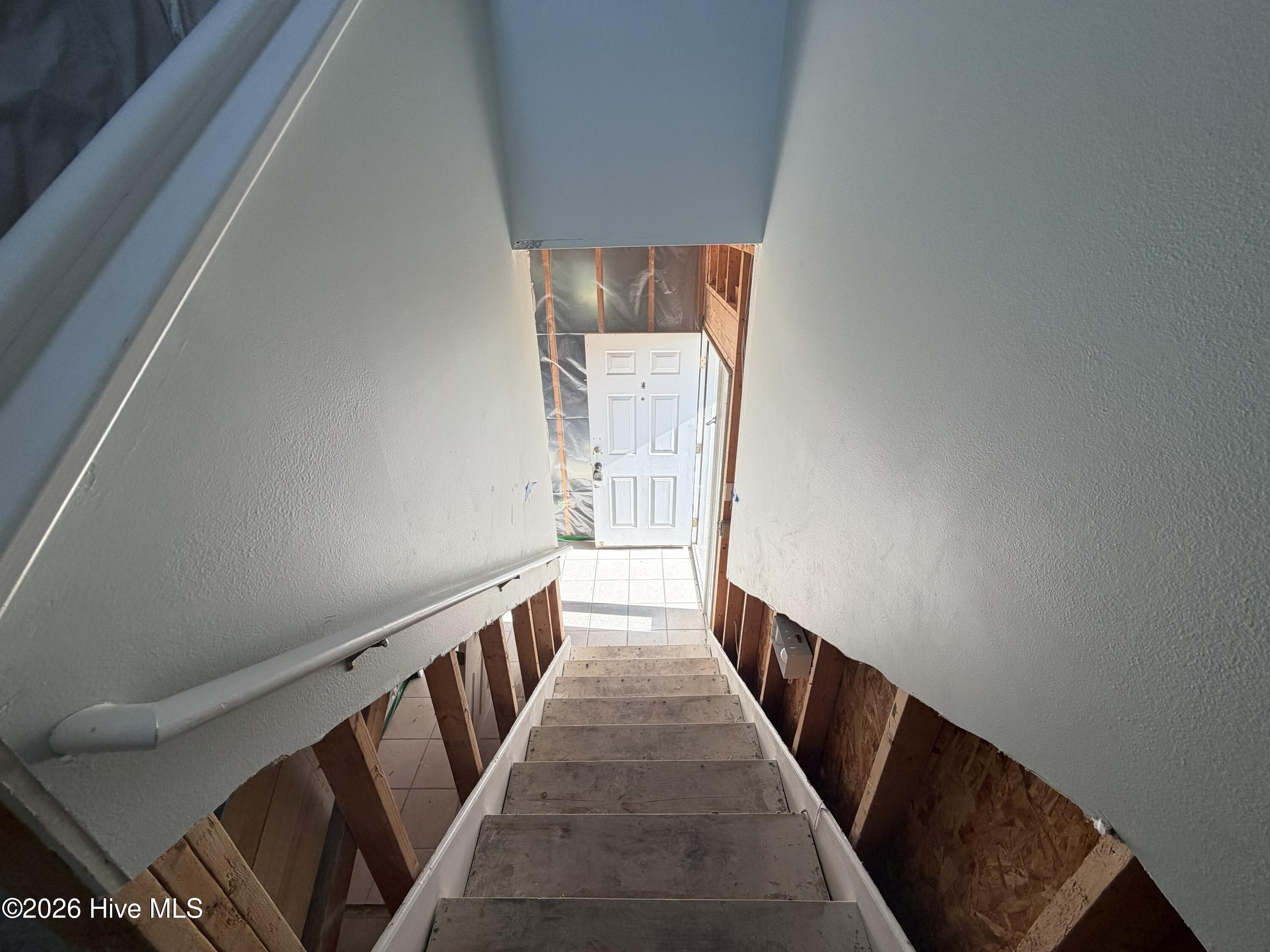 116 Rice Mill Circle, Unit 4 Sunset Beach, NC 28468 - Photo 25 of 29 Stairs from unit to exit.