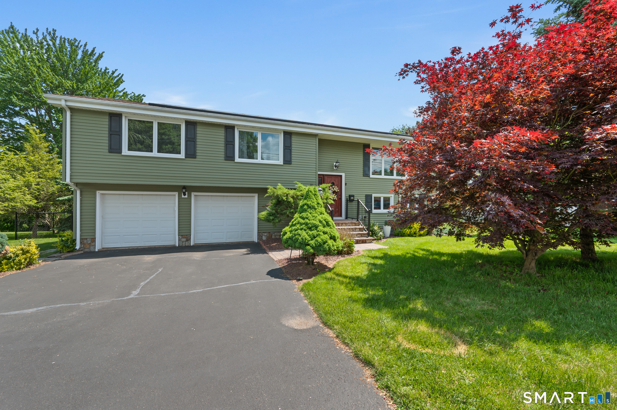 201 Ridge Crest Circle Wethersfield, CT 06109 - Photo 34 of 35 a house view with a garden space