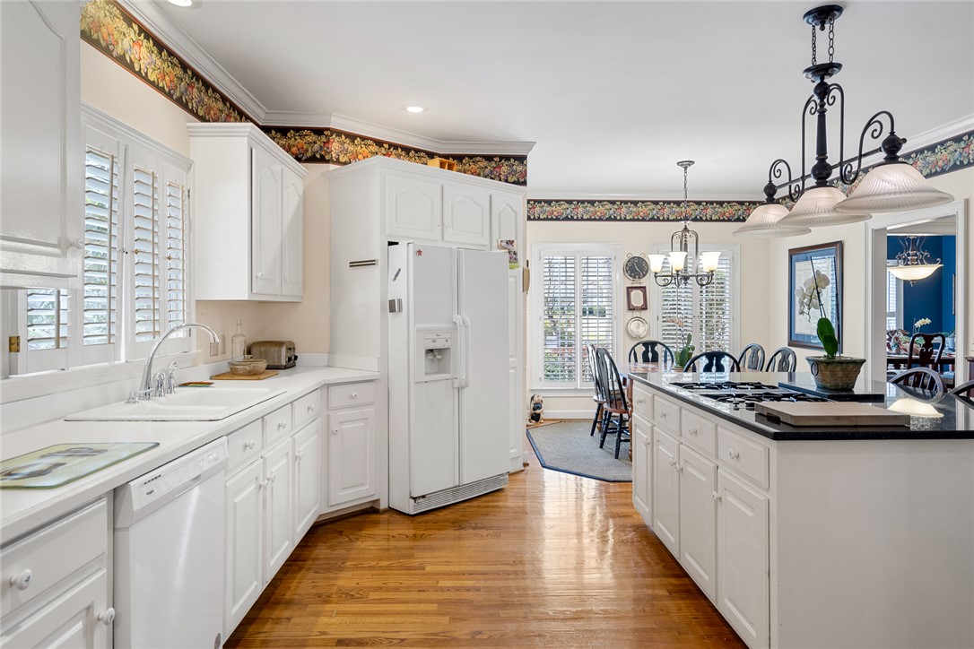 4011 Brackenberry Drive Anderson, SC 29621 - Photo 15 of 35 Bright and open kitchen with ample counter space connects to a spacious dining area.