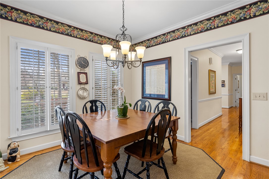 4011 Brackenberry Drive Anderson, SC 29621 - Photo 16 of 35 This inviting dining room offers a warm ambiance for memorable gatherings.