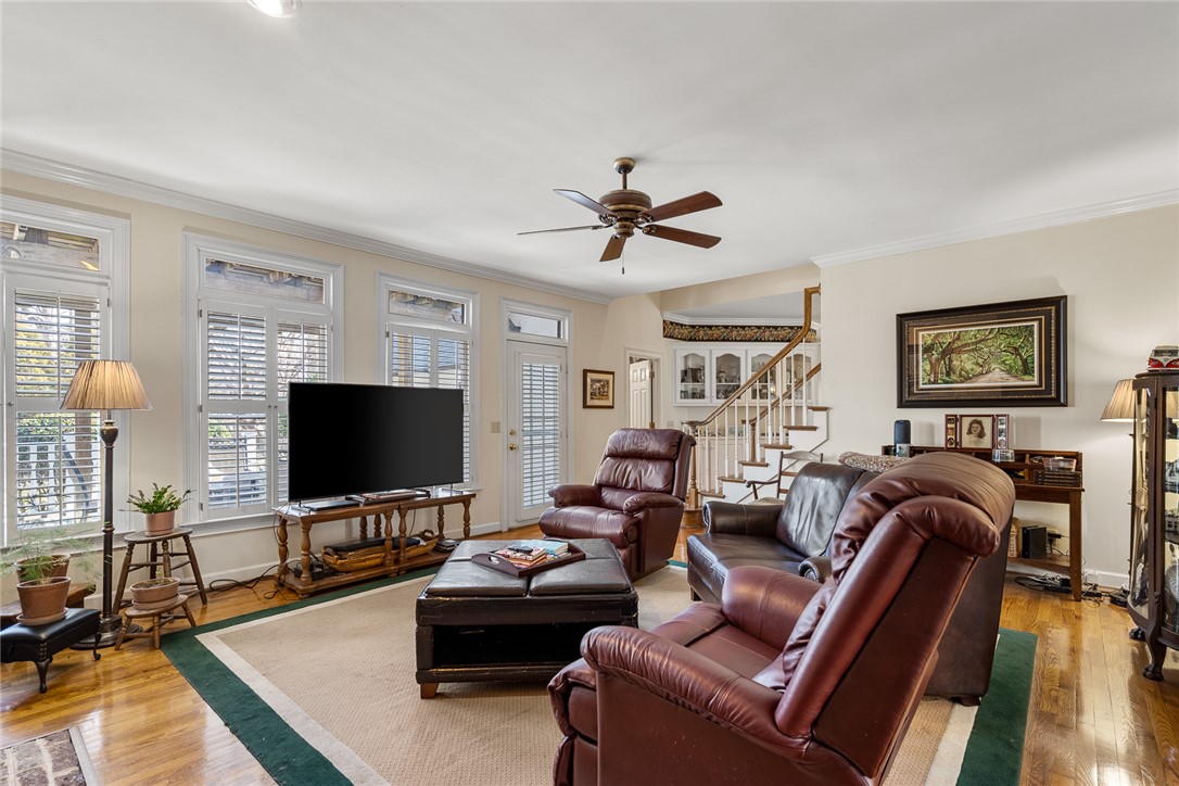 4011 Brackenberry Drive Anderson, SC 29621 - Photo 9 of 35 This inviting living space features gleaming hardwood floors and ample natural light, creating a comfortable atmosphere.