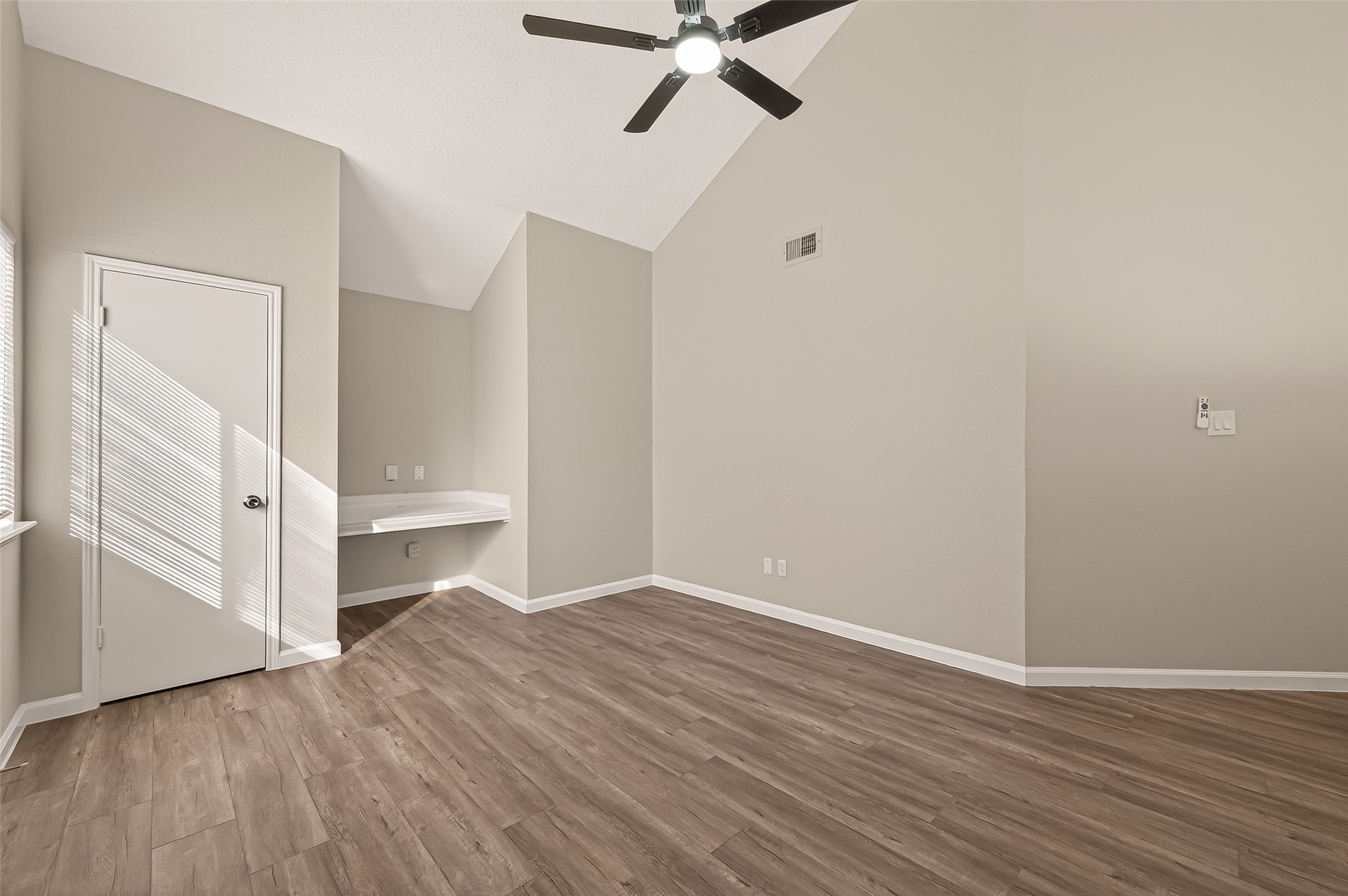 7622 Poitiers Drive Houston, TX 77071 - Photo 24 of 37 a view of an empty room and wooden floor