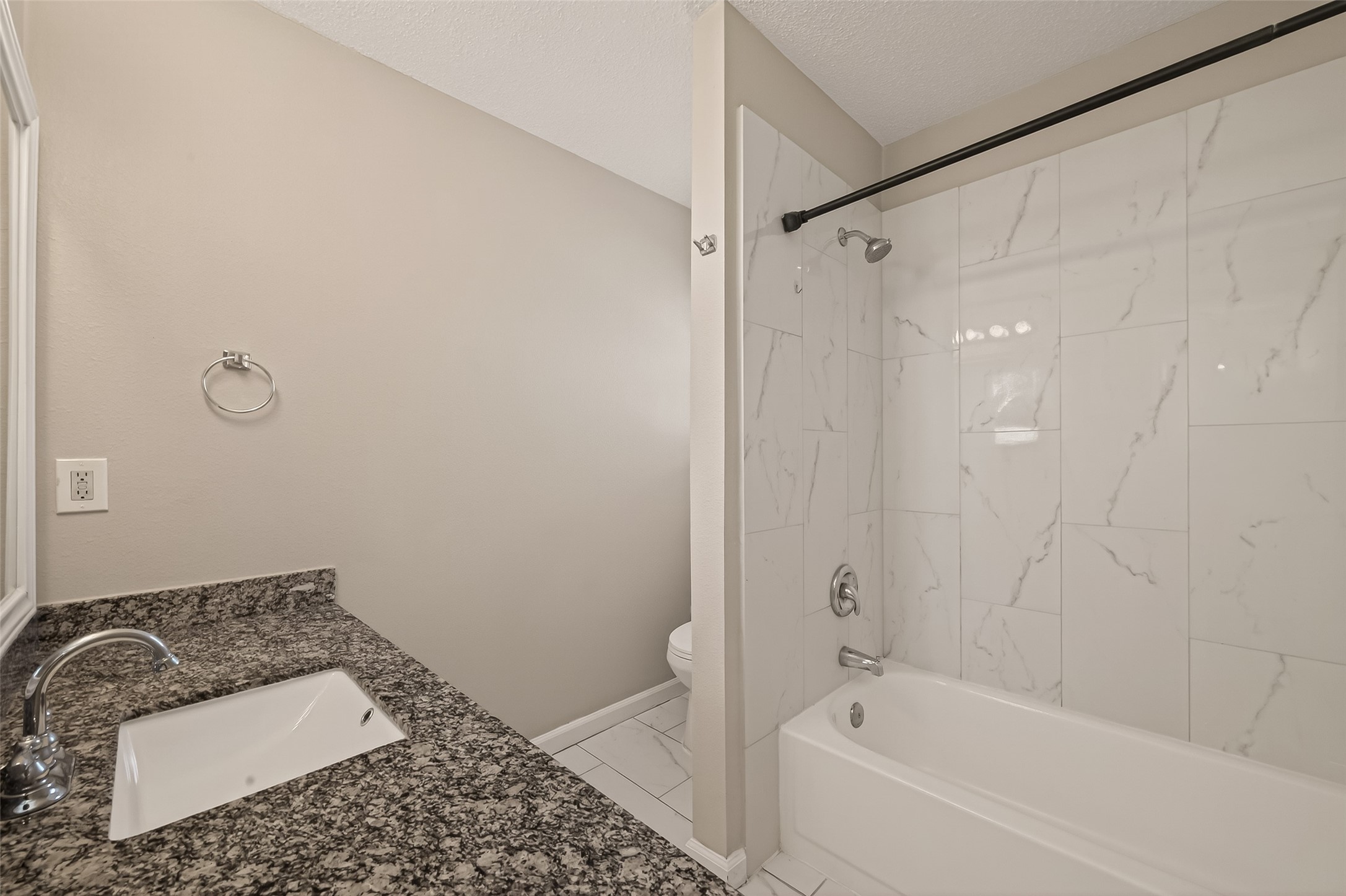 7622 Poitiers Drive Houston, TX 77071 - Photo 30 of 37 a bathroom with a bathtub and shower
