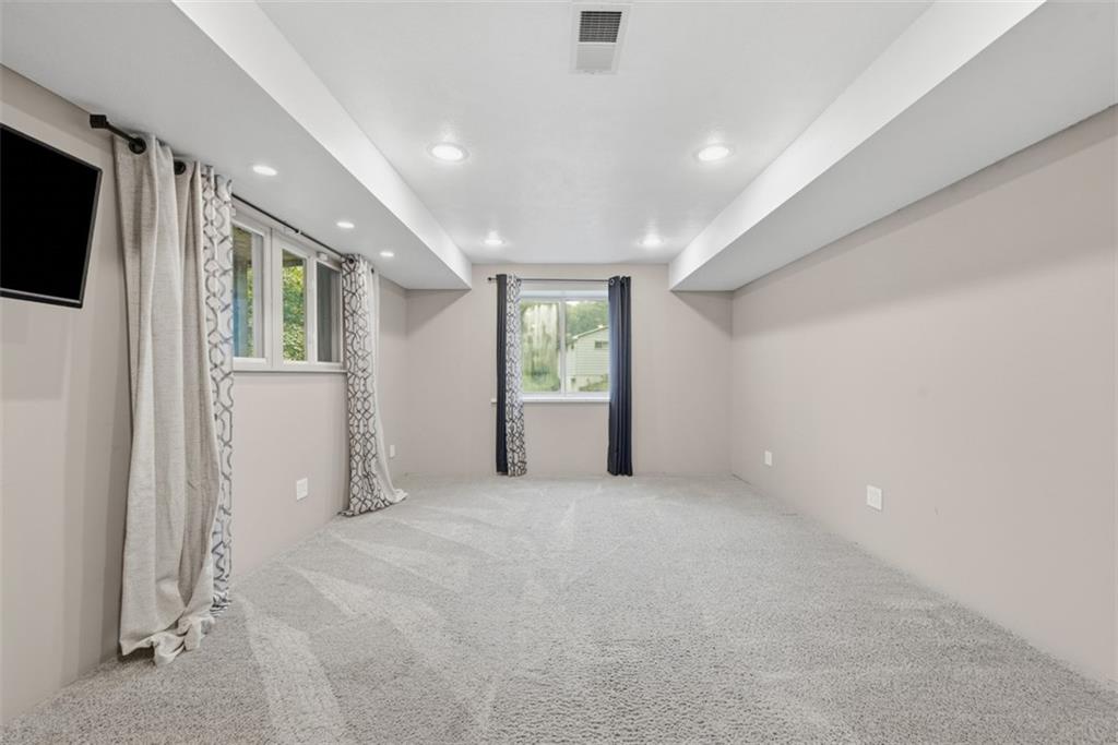 5380 Hardt Road Gibsonia, PA 15044 - Photo 30 of 49 This 5th bedroom on the lower level has proper egress windows and recessed lights.