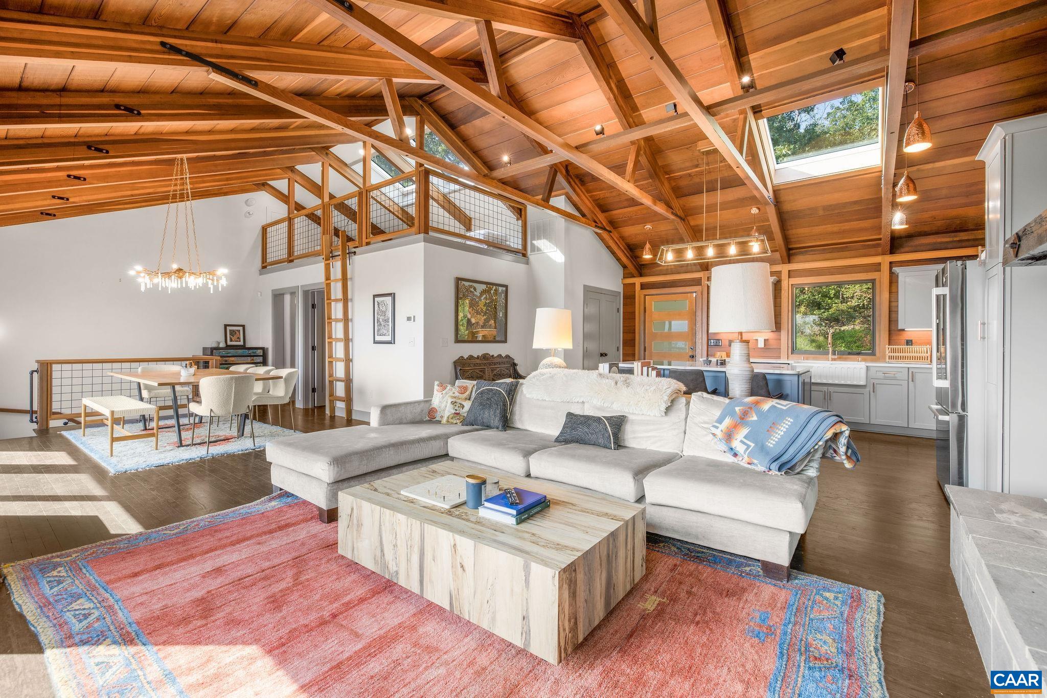 6288 Bryant Hollow Road Elkton, VA 22827 - Photo 23 of 54 a living room with furniture and a flat screen tv