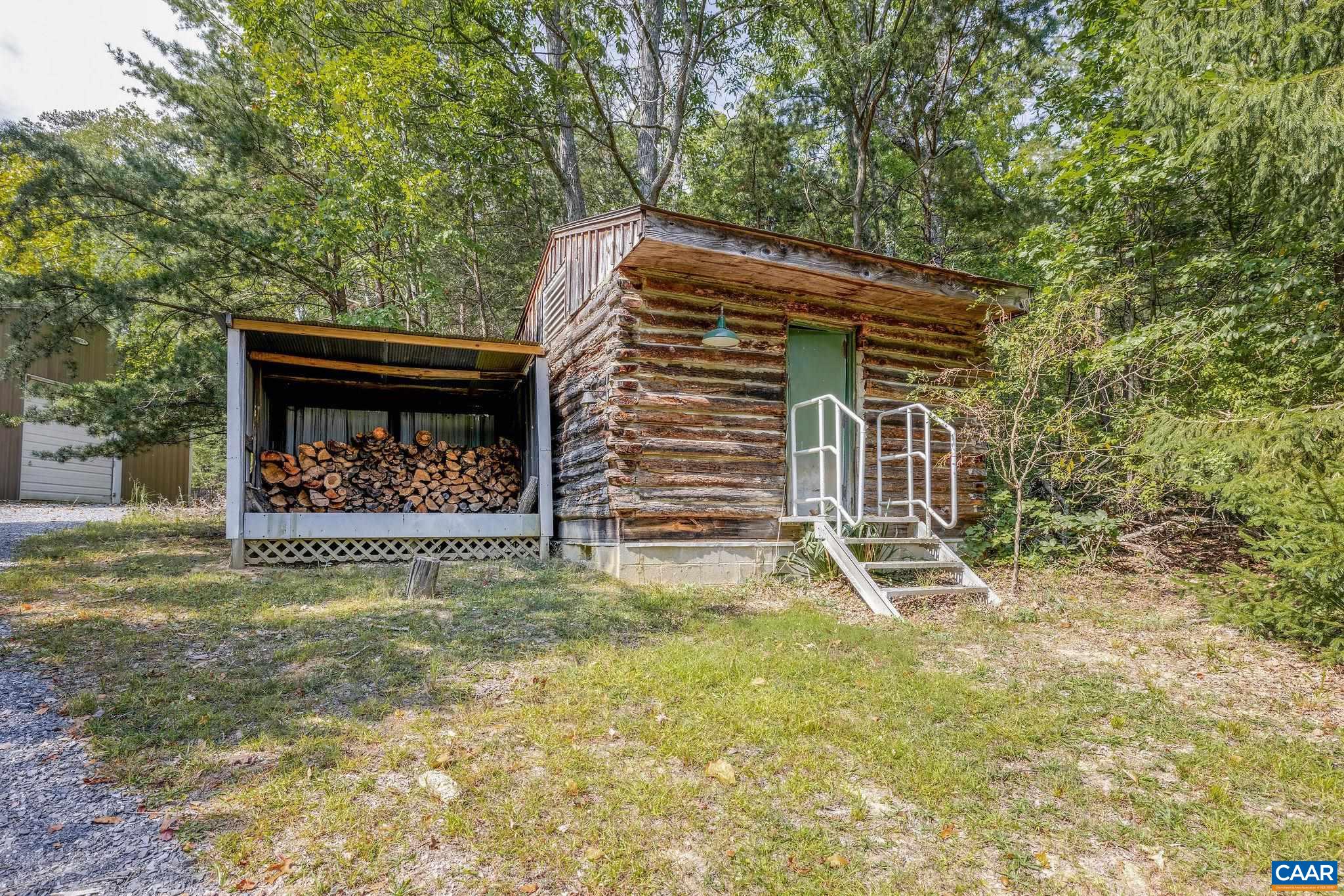 6288 Bryant Hollow Road Elkton, VA 22827 - Photo 46 of 54 a view of a house with a yard