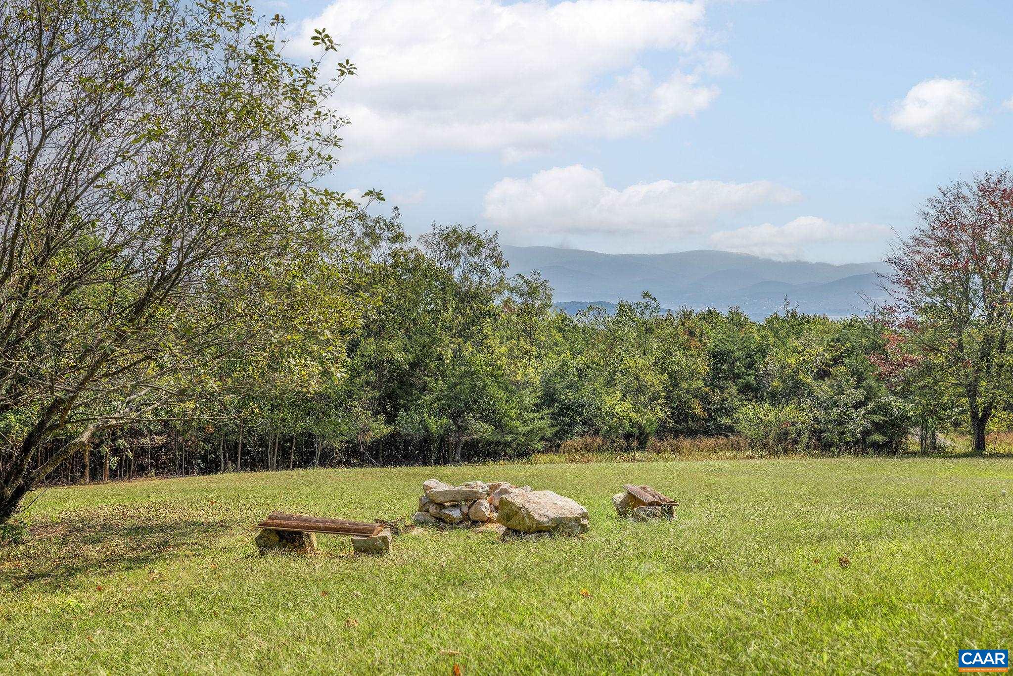 6288 Bryant Hollow Road Elkton, VA 22827 - Photo 49 of 54 a view of a yard with an outdoor seating