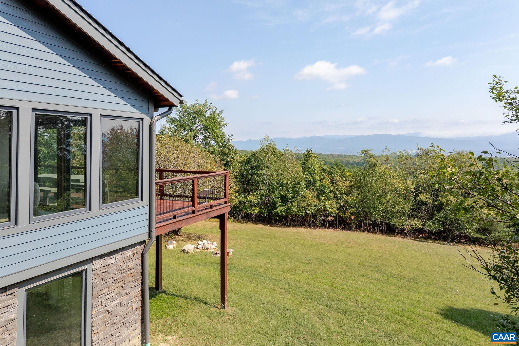 6288 Bryant Hollow Road Elkton, VA 22827 - Photo 7 of 54 a view of a house with a yard
