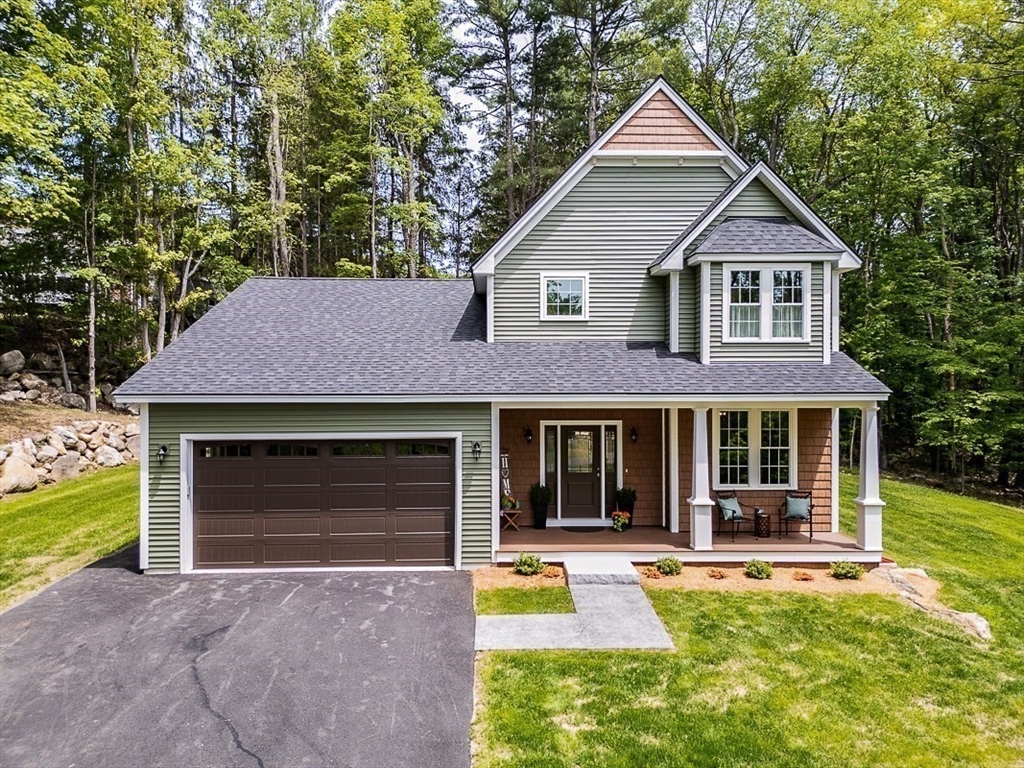 531 Clark Street Gardner, MA 01440 - Photo 1 of 42 a view of a house with a yard deck and a large tree