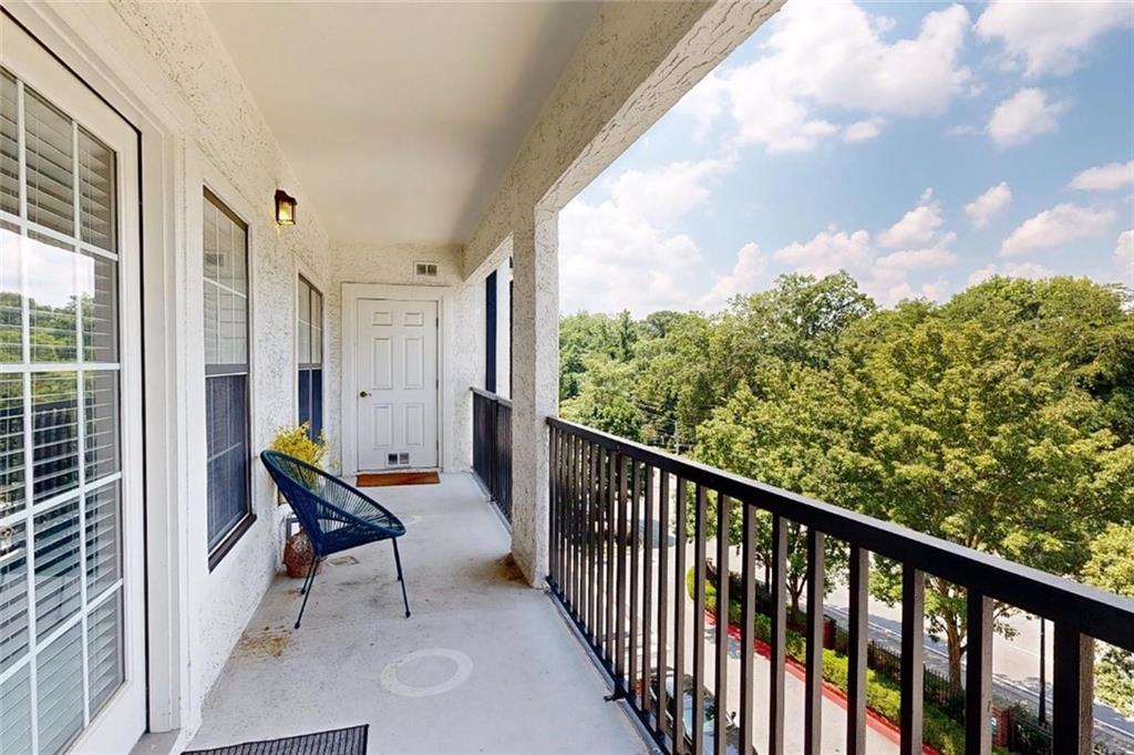 3275 Lenox Road Northeast, Unit 413 Atlanta, GA 30324 - Photo 22 of 52 a view of a two chair in the balcony